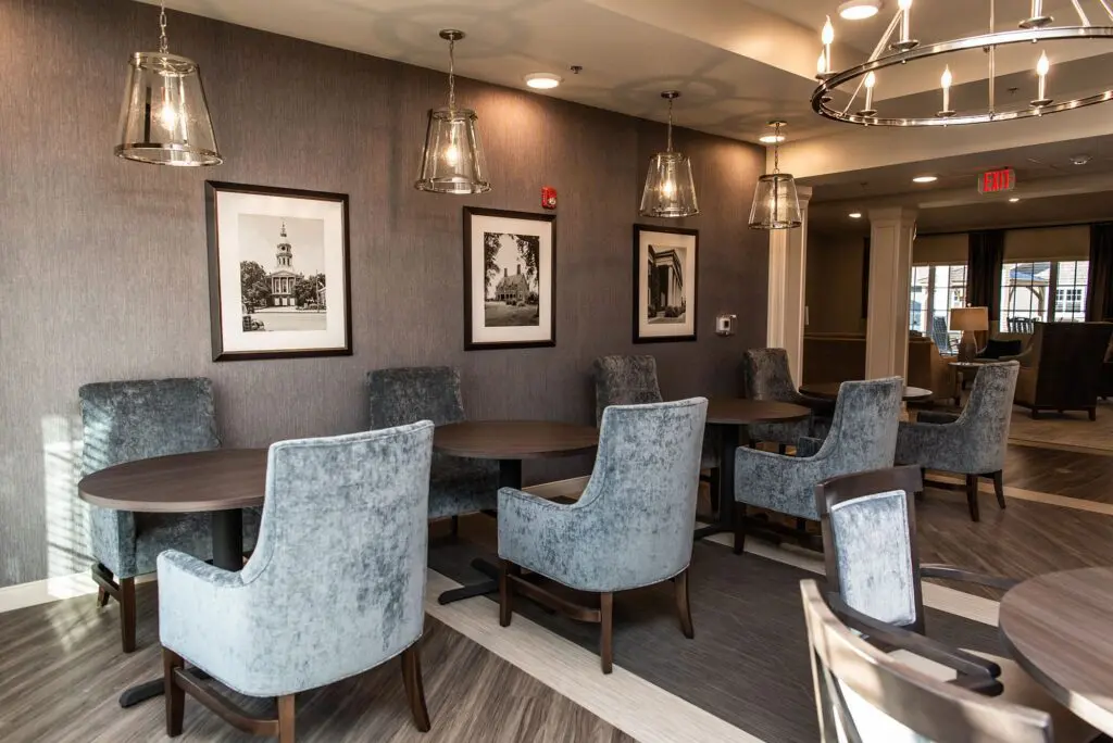 chairs and tables in communal area at community